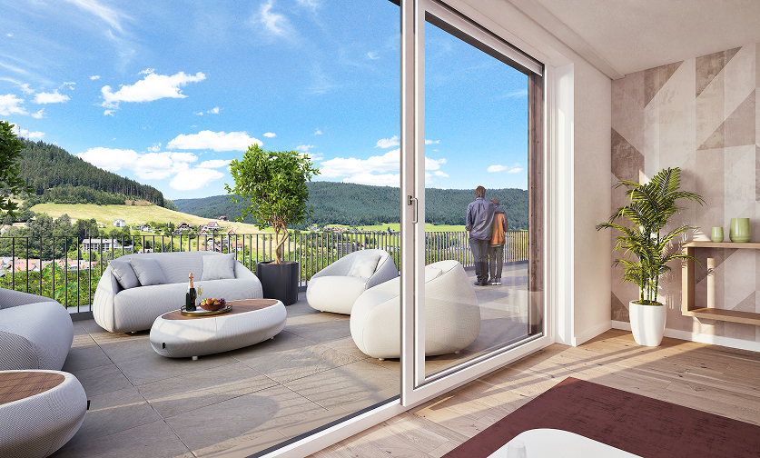 Heller Wohnbereich mit großer Terrasse und Blick auf die Landschaft
