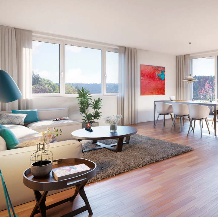 Lichtdurchflutetes, modernes Wohn- und Esszimmer als Beispiel für den Vermögensaufbau mit IMBRO Immobilien